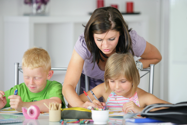 encouraged homeschool mom working with kids