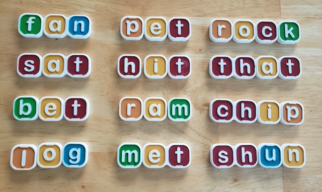 letter tiles spelling closed syllable words